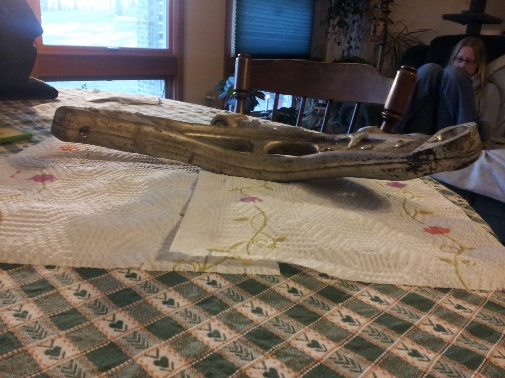 Side view of the removed aluminum front control arm